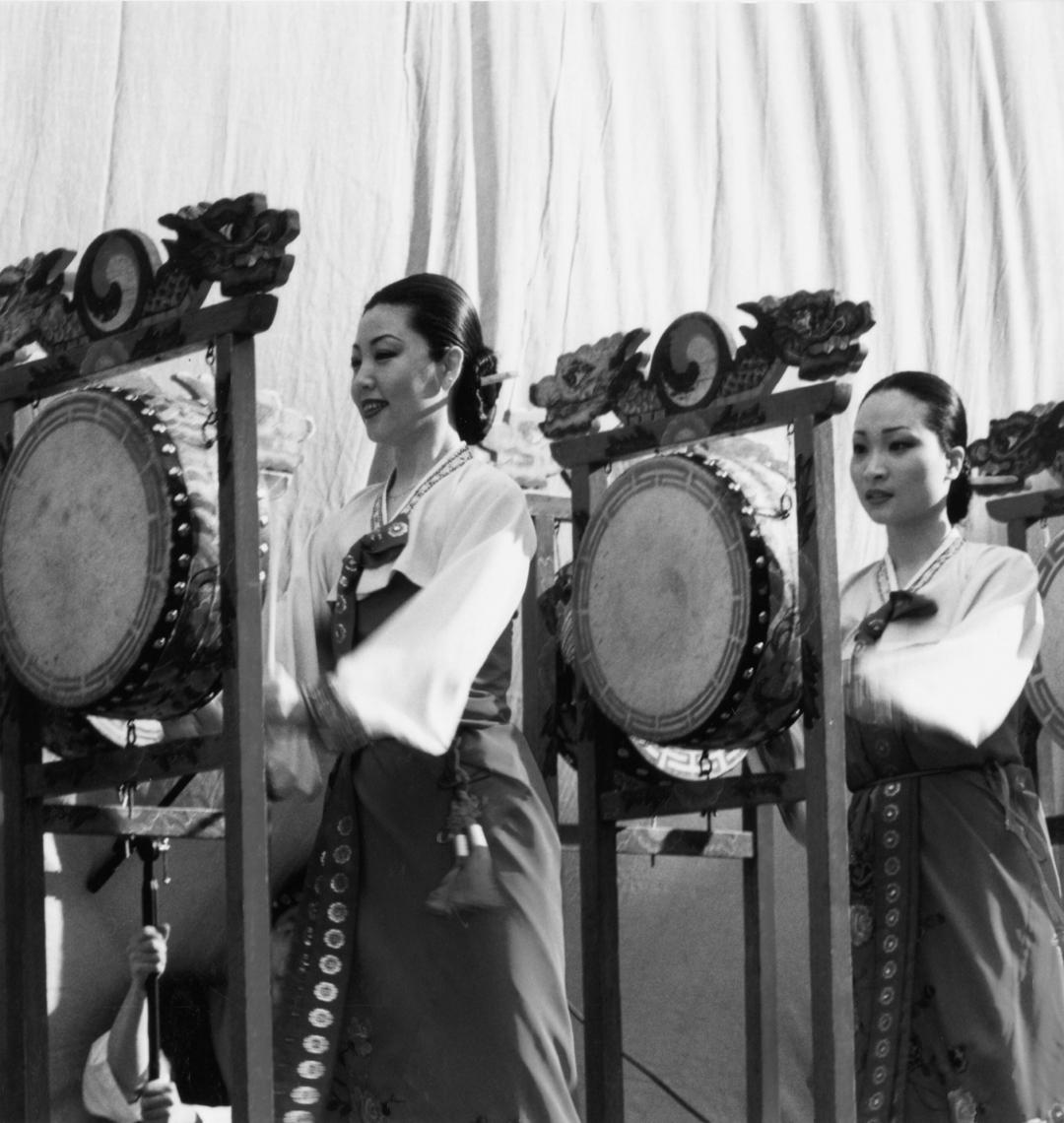 Korean dancers and musicians performing.